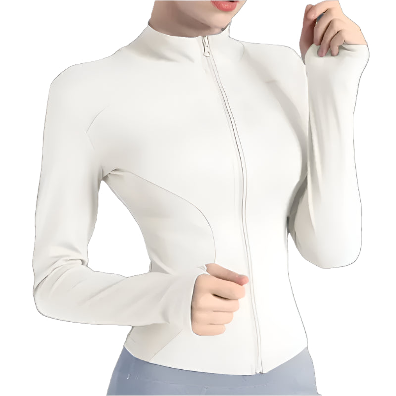 Woman wearing a white zip up thumb hole jacket and light blue leggings showing the front view against a white background