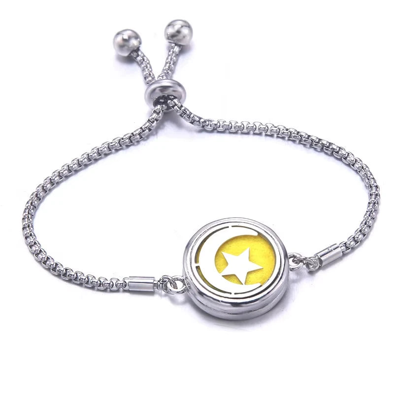 Silver bracelet with a yellow pad on a white background