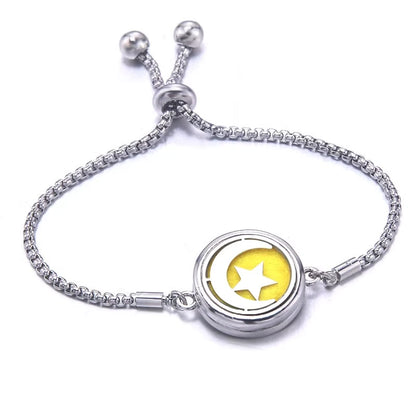 Silver bracelet with a yellow pad on a white background