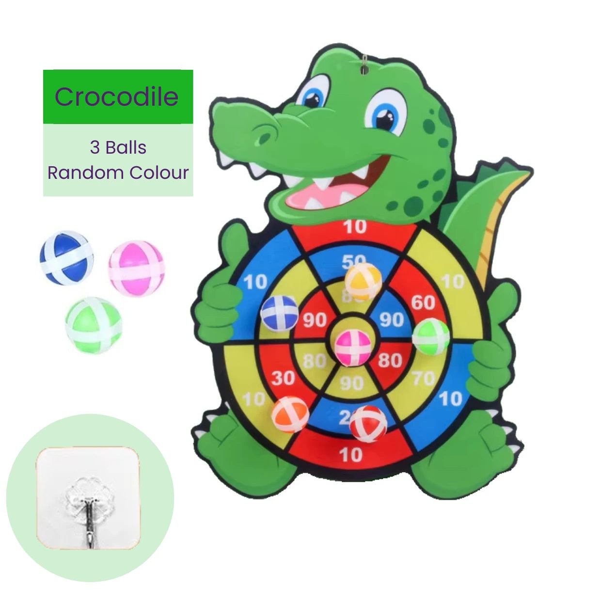 Children's target board toy shaped like a crocodile with colorful sticky balls and mounting hook on a white background