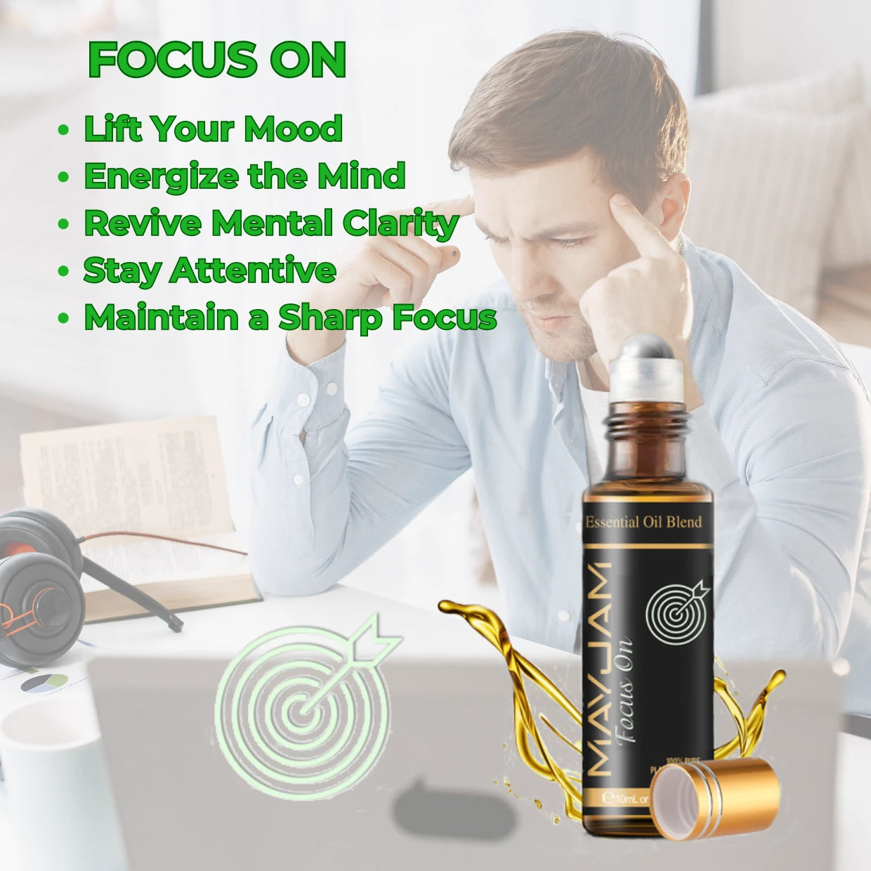 Man sitting at a desk with a laptop, and a bottle of Focus on Oil in the foreground.