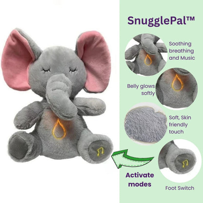 Gray elephant plush toy with pink ears and features on a green background