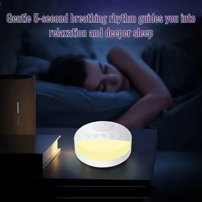 White noise machine on a nightstand with a person sleeping in the background