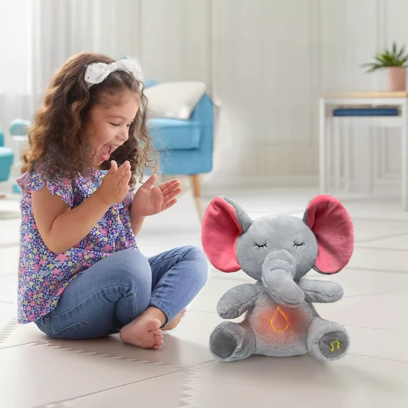 Child playing with a plush breathing elephant toy on a light wooden floor