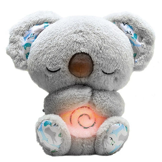 Plush toy koala with a glowing belly on a white background