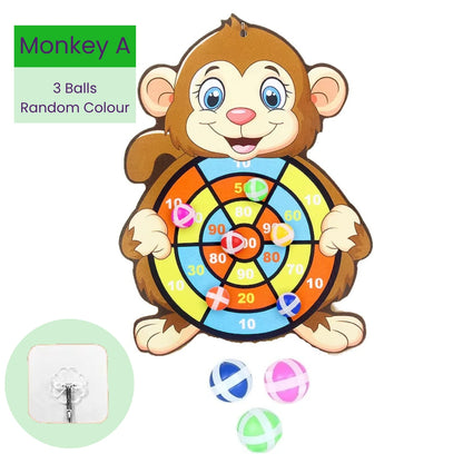 Children's target board toy shaped like a monkey with colorful sticky balls and mounting hook on a white background