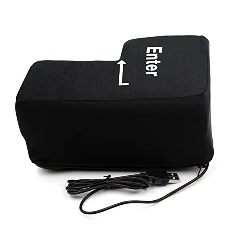 Side view of a Black big enter key  and USB cable on a white background