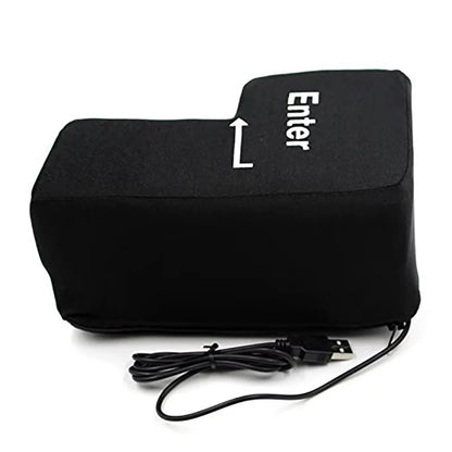Side view of a Black big enter key  and USB cable on a white background
