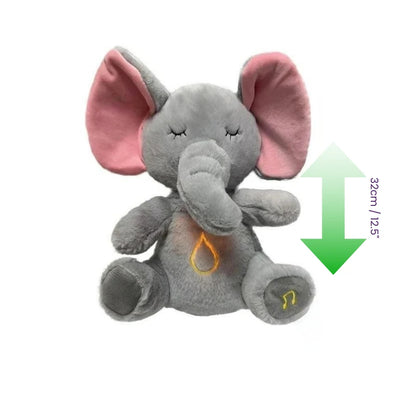 Plush elephant toy with pink ears and a green arrow indicating size on a white background