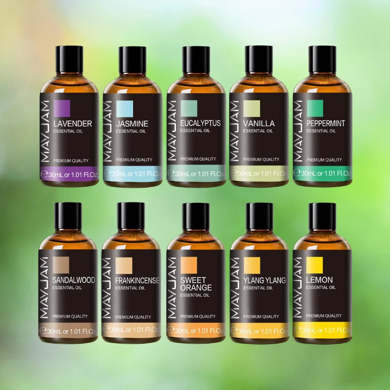 Collection of MayJam essential oil bottles on a green gradient background