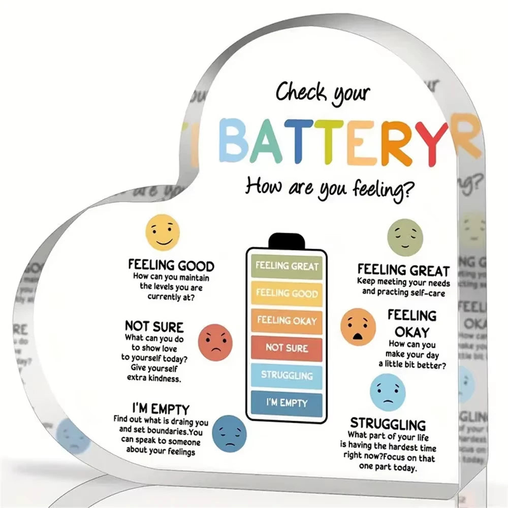 Heart-shaped acrylic plaque with emotional assessment chart and smiley face icons on a white background