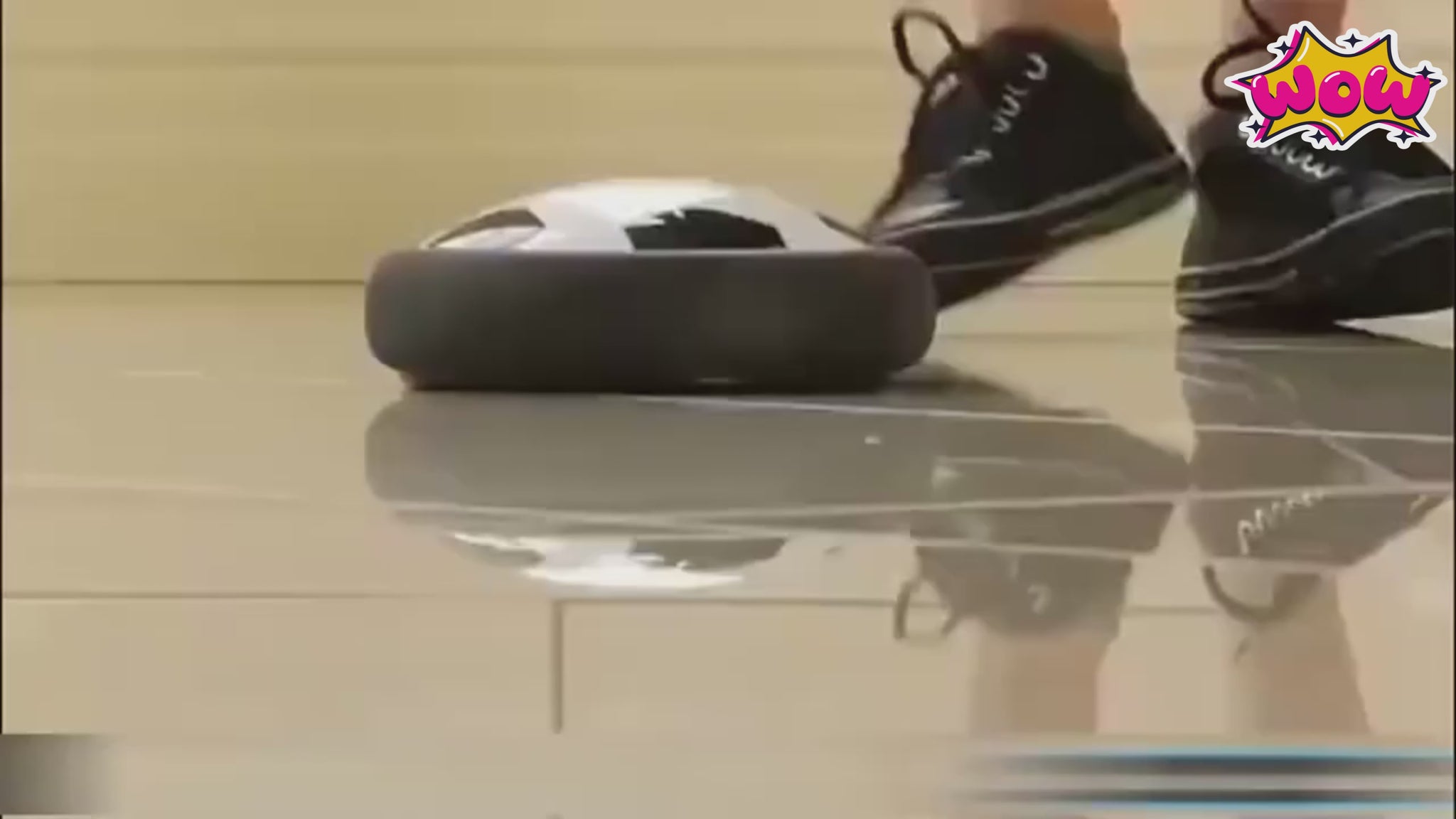 kids playing with the hover soccer ball in the house and passage