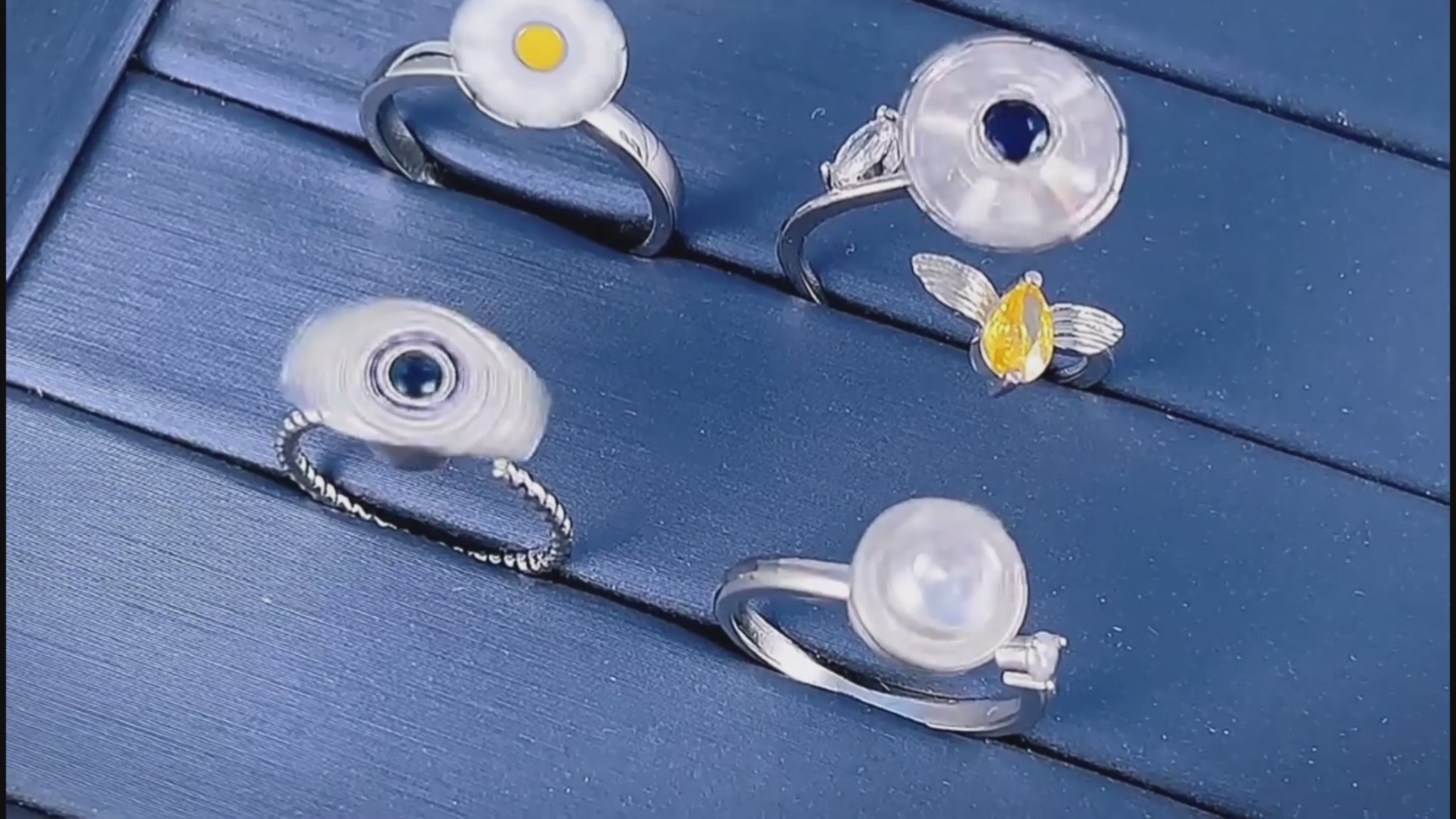 video showing the four spinner rings